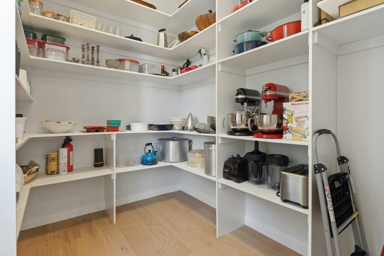 Slim rolling kitchen cart for no-pantry storage in small apartments