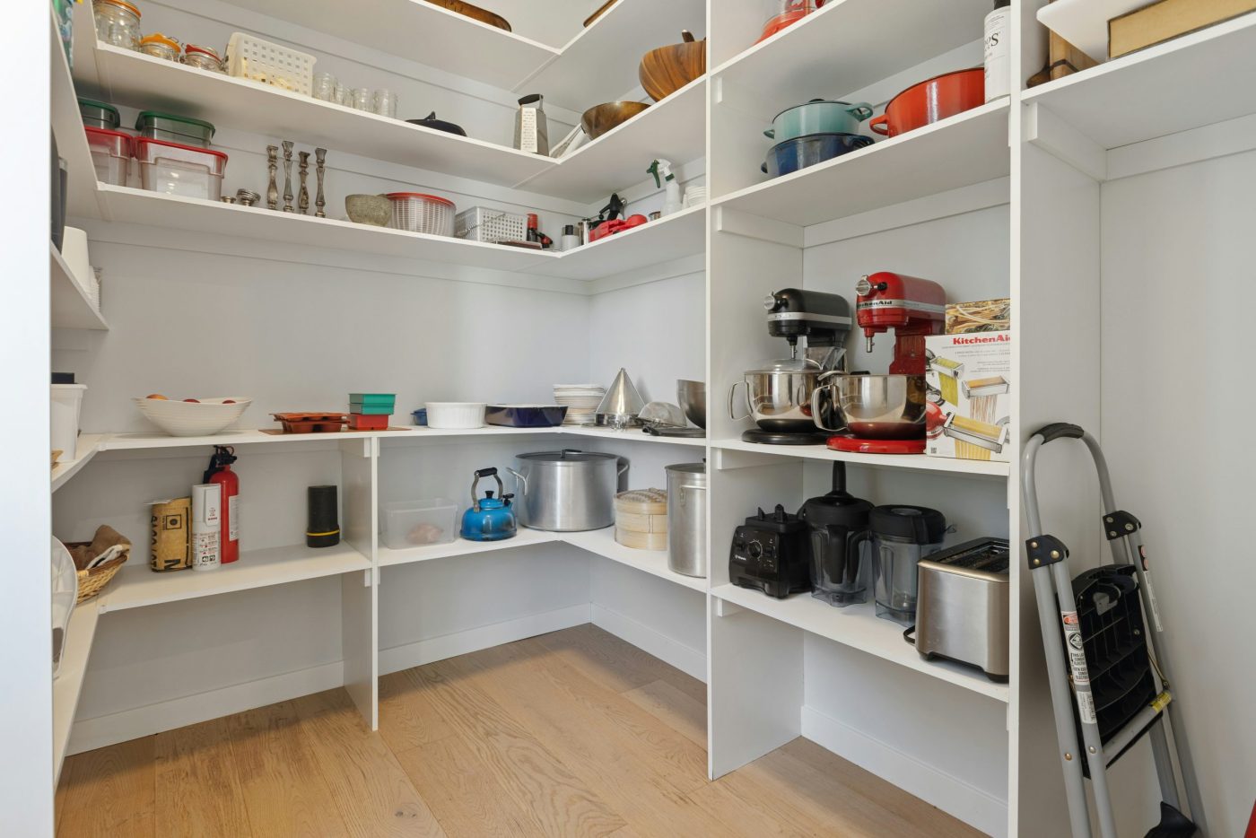 Slim rolling kitchen cart for no-pantry storage in small apartments